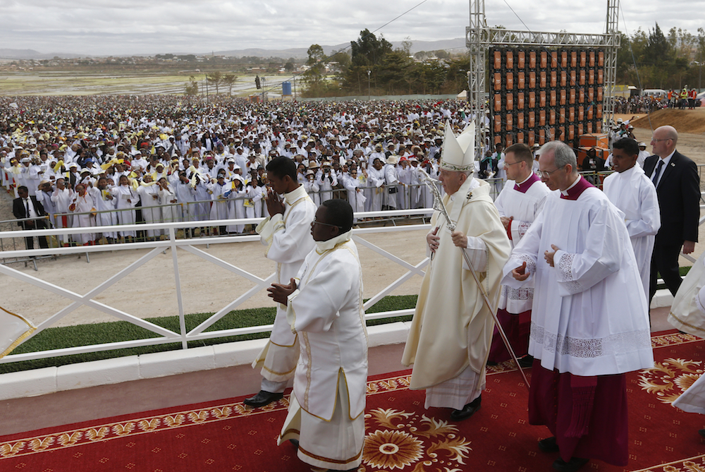 Francis encourages quarry workers, celebrates Mass with a million in